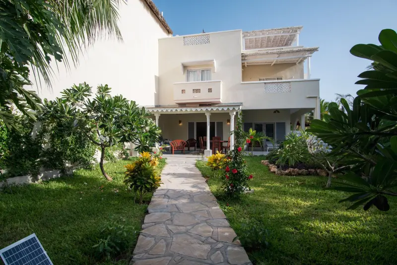 The villa from the garden path