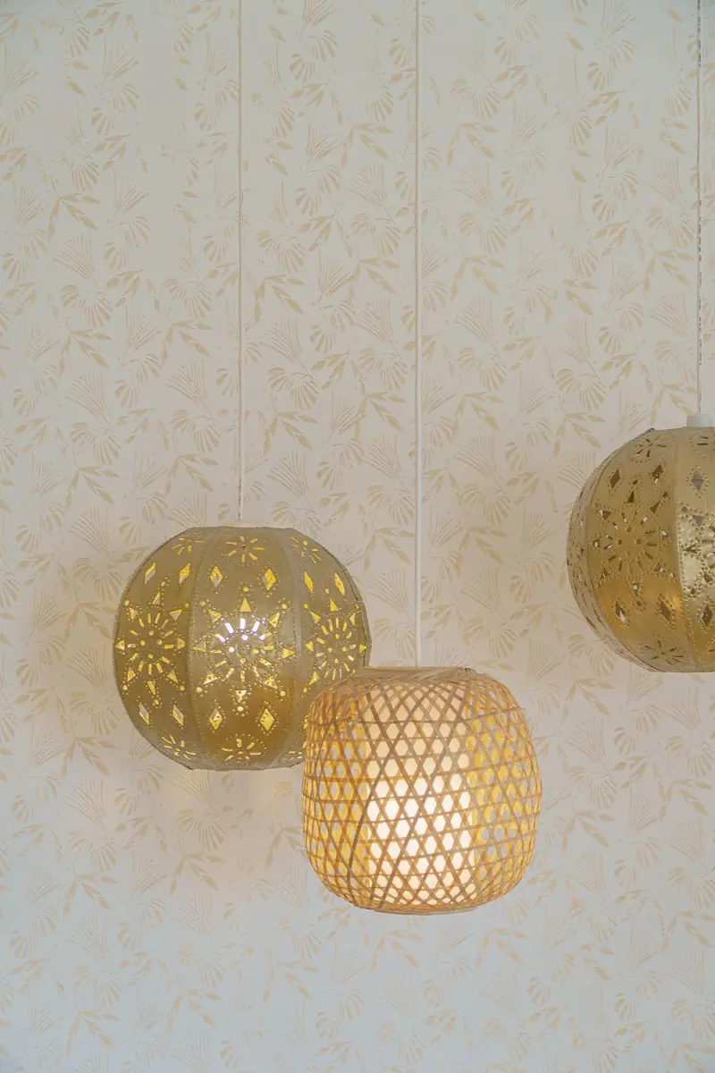 Woven lanterns glowing in the living room